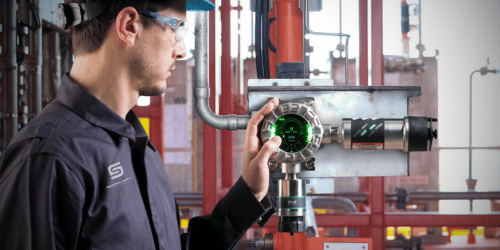Worker using qualified gas detector 