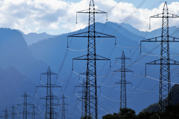 Power lines with mountains in the background