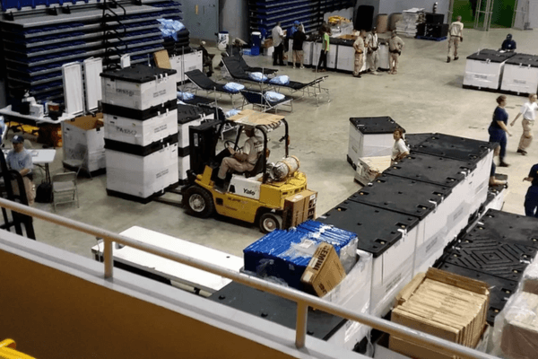 Worker on a forklift working in a warehouse